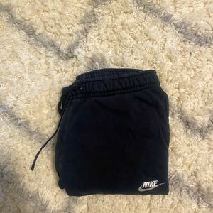 Men’s black Nike sweatpants in size small.